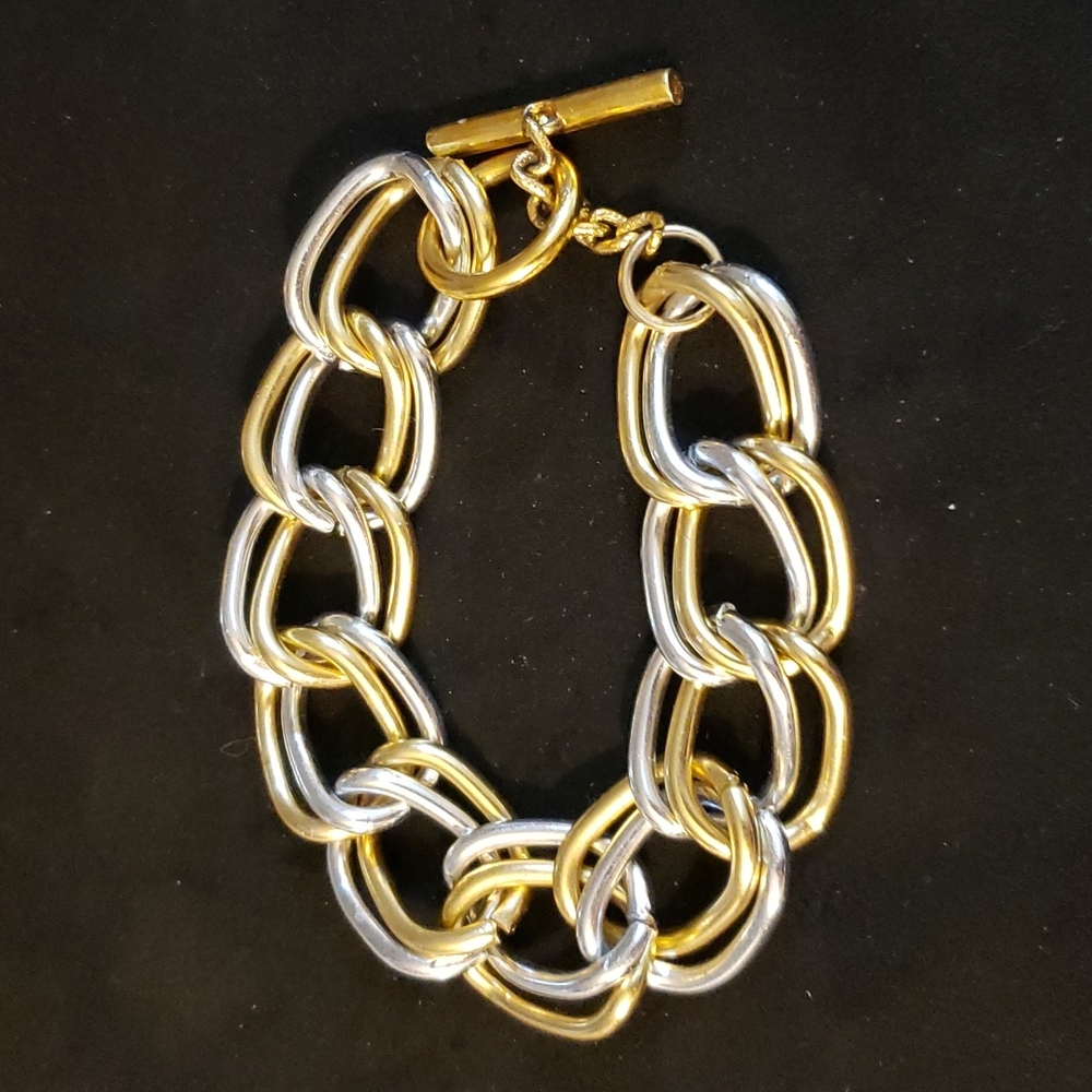 Gold tone and silver tone bracelet.